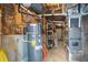 Utility basement showing water heater and HVAC system at 2962 Moorings Pkwy, Snellville, GA 30039