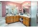 Spacious bathroom featuring dual vanities, a separate shower, and a luxurious soaking tub at 2962 Moorings Pkwy, Snellville, GA 30039