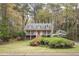 Charming two-story home with a welcoming front porch and beautifully landscaped yard at 2962 Moorings Pkwy, Snellville, GA 30039
