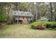 Beautiful two-story home featuring a classic design and well-maintained lawn at 2962 Moorings Pkwy, Snellville, GA 30039