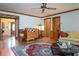 Spacious living room with hardwood floors, classic rug, and multiple entryways for easy access at 2962 Moorings Pkwy, Snellville, GA 30039