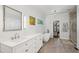 Bright bathroom features a soaking tub, separate shower, and double vanity sinks at 4152 Club Ne Dr, Atlanta, GA 30319