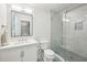 Modern bathroom featuring a glass-enclosed shower and vanity at 4152 Club Ne Dr, Atlanta, GA 30319