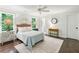 Serene bedroom with hardwood floors and natural light at 4152 Club Ne Dr, Atlanta, GA 30319