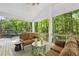 Outdoor deck with seating and wooded views at 4152 Club Ne Dr, Atlanta, GA 30319
