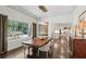 Elegant dining room featuring hardwood floors, natural light, and stylish pendant lighting at 4152 Club Ne Dr, Atlanta, GA 30319