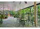 Back patio with stone pavers, a dining set, and a view of the backyard with a play set at 4152 Club Ne Dr, Atlanta, GA 30319