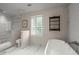 This bathroom features a modern shower, bathtub, and elegant fixtures, creating a luxurious and relaxing experience at 5515 Cross Gate Ct, Sandy Springs, GA 30327