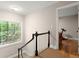 Stairwell area with views of wooded scenery at 5515 Cross Gate Ct, Sandy Springs, GA 30327
