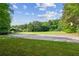 Community basketball court featuring well-maintained surface and equipment, surrounded by greenery at 7020 Weybridge Dr, Cumming, GA 30040
