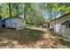 Backyard with detached garage and a secondary storage building at 92 Valley Se Trl, Acworth, GA 30101