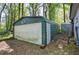 Spacious green and white detached garage with ample storage space at 92 Valley Se Trl, Acworth, GA 30101