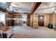 Spacious living room featuring wood paneling, ceiling fans, and wood accents at 92 Valley Se Trl, Acworth, GA 30101
