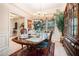 Formal dining room features a large table, elegant decor, and a bright, inviting space at 1935 Knight Cir, Loganville, GA 30052