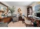 Elegant home office with custom shelves, dark wood trim, and natural lighting at 1935 Knight Cir, Loganville, GA 30052