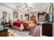 Cozy main bedroom with tray ceilings, large windows with drapes, and ample closet space at 1935 Knight Cir, Loganville, GA 30052
