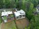 Stunning aerial view of modern homes, showcasing unique architecture and spacious yards surrounded by lush greenery at 2650 Fairoaks Rd, Decatur, GA 30033