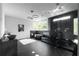 Modern bathroom with marble tile, glass shower, vessel sinks, and unique lighting at 2650 Fairoaks Rd, Decatur, GA 30033