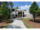 Contemporary home featuring a modern design, large windows, and a neatly manicured front yard at 2650 Fairoaks Rd, Decatur, GA 30033
