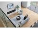 Open-concept living room features high ceilings, stylish decor, modern fireplace, and seamless flow to kitchen area for contemporary living at 2650 Fairoaks Rd, Decatur, GA 30033