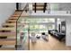 Open-concept kitchen and living room features expansive windows and seamless transition to the outdoors provides bright and airy living at 2650 Fairoaks Rd, Decatur, GA 30033