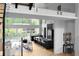 Open-concept kitchen and living room features expansive windows and seamless transition to the outdoors provides bright and airy living at 2650 Fairoaks Rd, Decatur, GA 30033