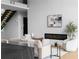 Elegant living room with modern fireplace, plush seating and neutral decor creates a welcoming and sophisticated atmosphere at 2650 Fairoaks Rd, Decatur, GA 30033