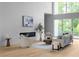 Stylish living room features modern fireplace, neutral decor, and plenty of natural light for comfortable and sophisticated living at 2650 Fairoaks Rd, Decatur, GA 30033