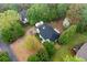 Aerial view of the home showcasing the roof, lot, nearby streets, and landscaping at 350 Spring View Ct, Dallas, GA 30157