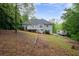 Exterior home view showing a back deck, stairs, landscaping, and an RV at 350 Spring View Ct, Dallas, GA 30157