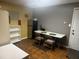 Finished basement featuring a dining area, kitchen appliances, and a doorway at 350 Spring View Ct, Dallas, GA 30157