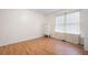 Bedroom featuring hardwood floors, closet and window at 350 Spring View Ct, Dallas, GA 30157