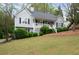 Charming home featuring a well-maintained lawn and a classic porch at 350 Spring View Ct, Dallas, GA 30157
