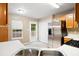 Kitchen featuring stainless steel appliances, bright lighting, and white countertops at 350 Spring View Ct, Dallas, GA 30157