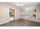 Open concept living area with fireplace and hardwood floors at 350 Spring View Ct, Dallas, GA 30157