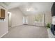 Spacious living room featuring a fireplace, carpet, and lots of natural light at 350 Spring View Ct, Dallas, GA 30157