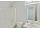 Bathroom featuring a shower-tub, vanity, and toilet at 362 Mcgiboney Rd, Covington, GA 30016
