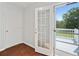 Bright doorway leading to the deck with white trim and natural light at 362 Mcgiboney Rd, Covington, GA 30016