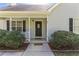 Inviting front porch with white railings and charming details, enhancing the home's curb appeal at 362 Mcgiboney Rd, Covington, GA 30016