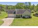 Charming single-Gathering home with a well-maintained lawn, a two-car garage, and cozy front porch at 362 Mcgiboney Rd, Covington, GA 30016
