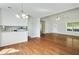 Open-concept living room boasting vaulted ceilings and hardwood flooring at 362 Mcgiboney Rd, Covington, GA 30016