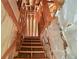 Unfinished wooden stairway with exposed framing leading to the upper level of the home at 362 Mcgiboney Rd, Covington, GA 30016