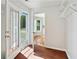 Bright sunroom with French doors leading to a patio area at 362 Mcgiboney Rd, Covington, GA 30016