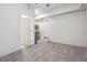 Bright bonus room featuring a kitchenette and carpeted floors at 760 Woodrow Dr, Lawrenceville, GA 30043