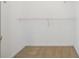 Empty walk-in closet with carpet floors at 760 Woodrow Dr, Lawrenceville, GA 30043