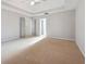 Large bedroom with carpet flooring and neutral colors at 760 Woodrow Dr, Lawrenceville, GA 30043