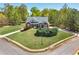 Beautiful brick home on a large lot with lush green grass and mature trees at 7804 Gusty Trl, Douglasville, GA 30135