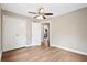 Open bedroom view with ceiling fan, closet, and neutral wall color, offering a calming atmosphere at 1623 Athens Sw Ave, Atlanta, GA 30310