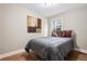 This bedroom offers hardwood floors, neutral walls, and a window, creating a bright and airy space at 1623 Athens Sw Ave, Atlanta, GA 30310