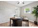 Bright office space with hardwood floors, a neutral color scheme, a desk and chair, and a view to the outside at 1623 Athens Sw Ave, Atlanta, GA 30310